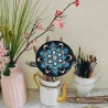 Sustainable art: upcycled CD painted by hand, perfect for original interiors.